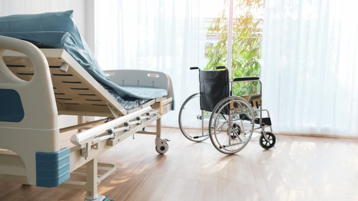 wheelchair patient bed is in the hospital ward